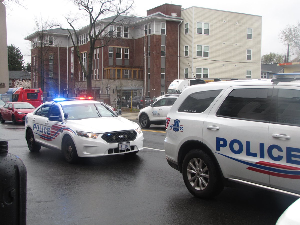 Hotbox, 5100 blk of Georgia Ave NW in 16th Street Heights DC  the worker was shot in the stomach while the business was being robbed. Suspects are 2 males with purple surgical gloves and a duffel bag, still armed.