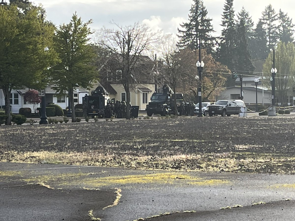 SWAT escort a man out of the house.  SWAT presence around Washington and 7th in Hillsboro. Both roads are closed for a couple blocks in each direction. Multiple agencies on scene. Authorities say a man is barricaded inside a home