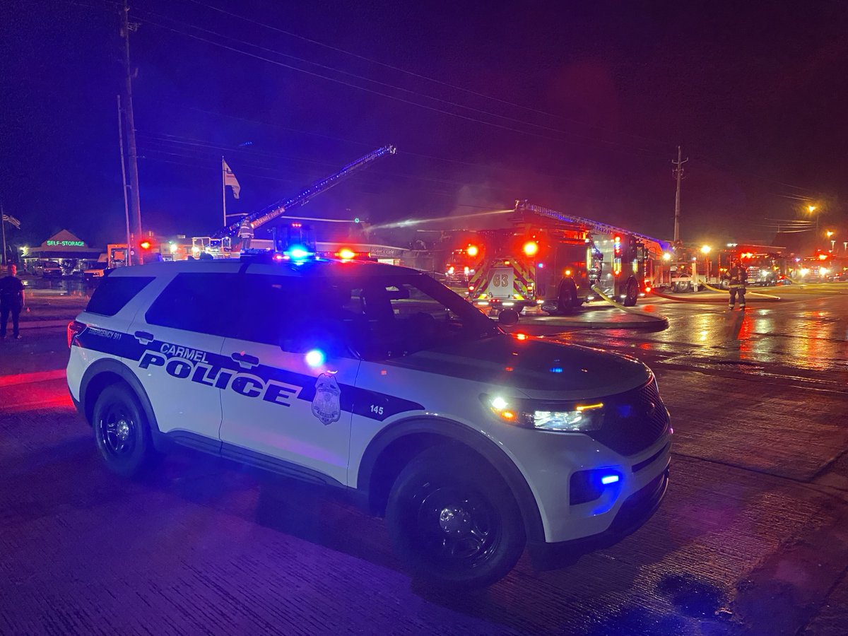 Crews are battling a fire that's caused extensive damage at a strip mall near North Michigan Road and West 96th Street in Carmel. At least one injury has been reported. Both directions of Michigan Road are closed in the area