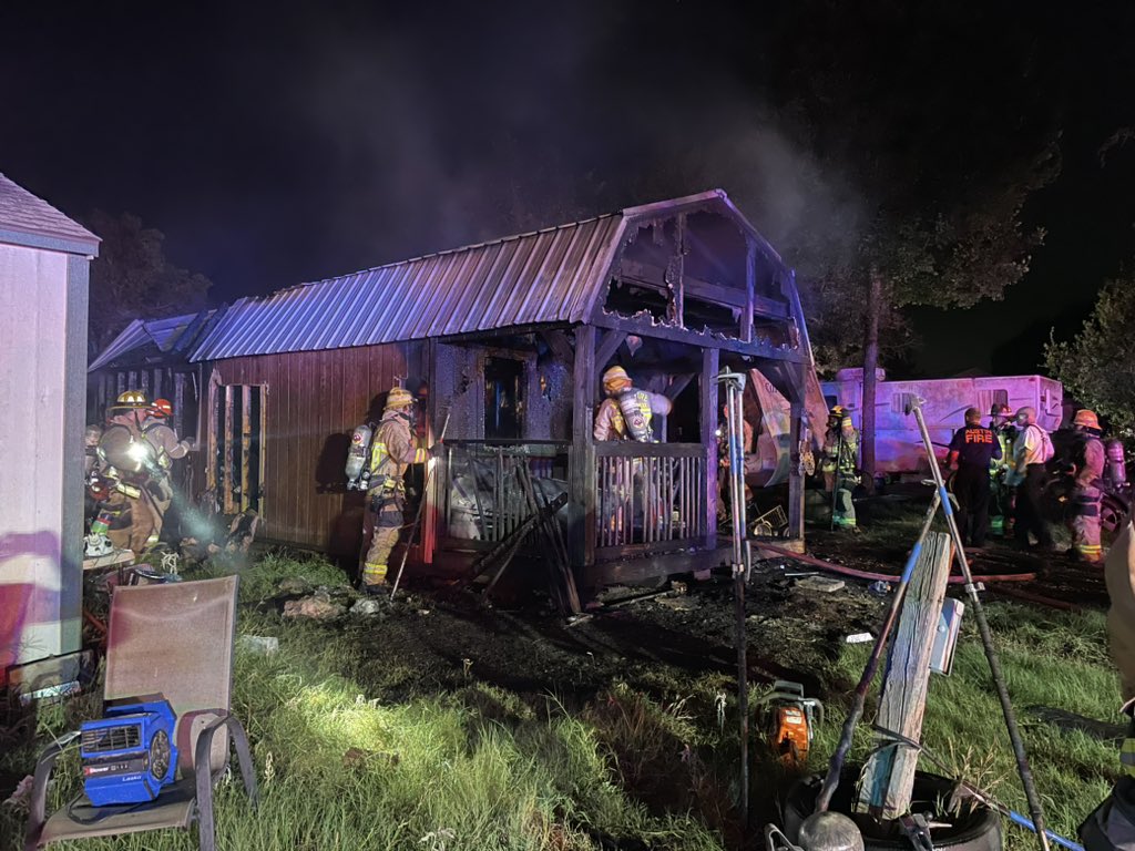 5200 blk of FM 973 with an approx. 800 sq. ft. shed, fully involved, that extended into an occupied RC. The lone occupant was able to make it out unharmed. No reported injuries. The fire is out and crews are checking for hot spots