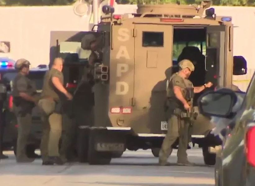 A shooting suspect, who had been barricaded inside a Southwest Side home for over five hours, was arrested after SWAT used tear gas, K9 to locate him in an attic crawlspace