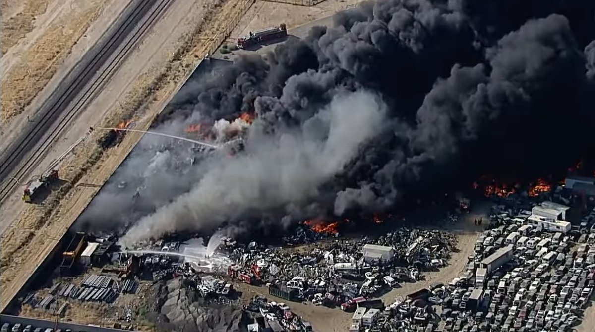 180 firefighters continue to battle 10 acres of burning salvage cars. Property is 20 acres   1,500 cars burned.Engine companies and specialized equipment are making significant progress. No injuries reported (from earlier in incident)Lancaster