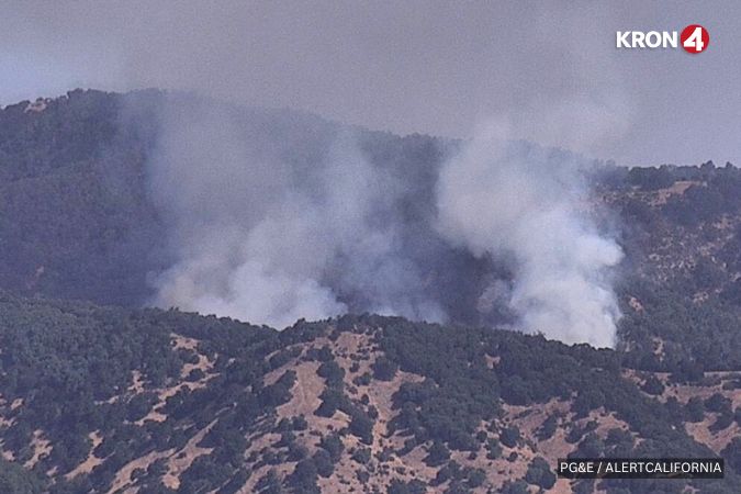 Firefighters are battling a wildfire in Marin County that has spread to 15 acres, fire officials say