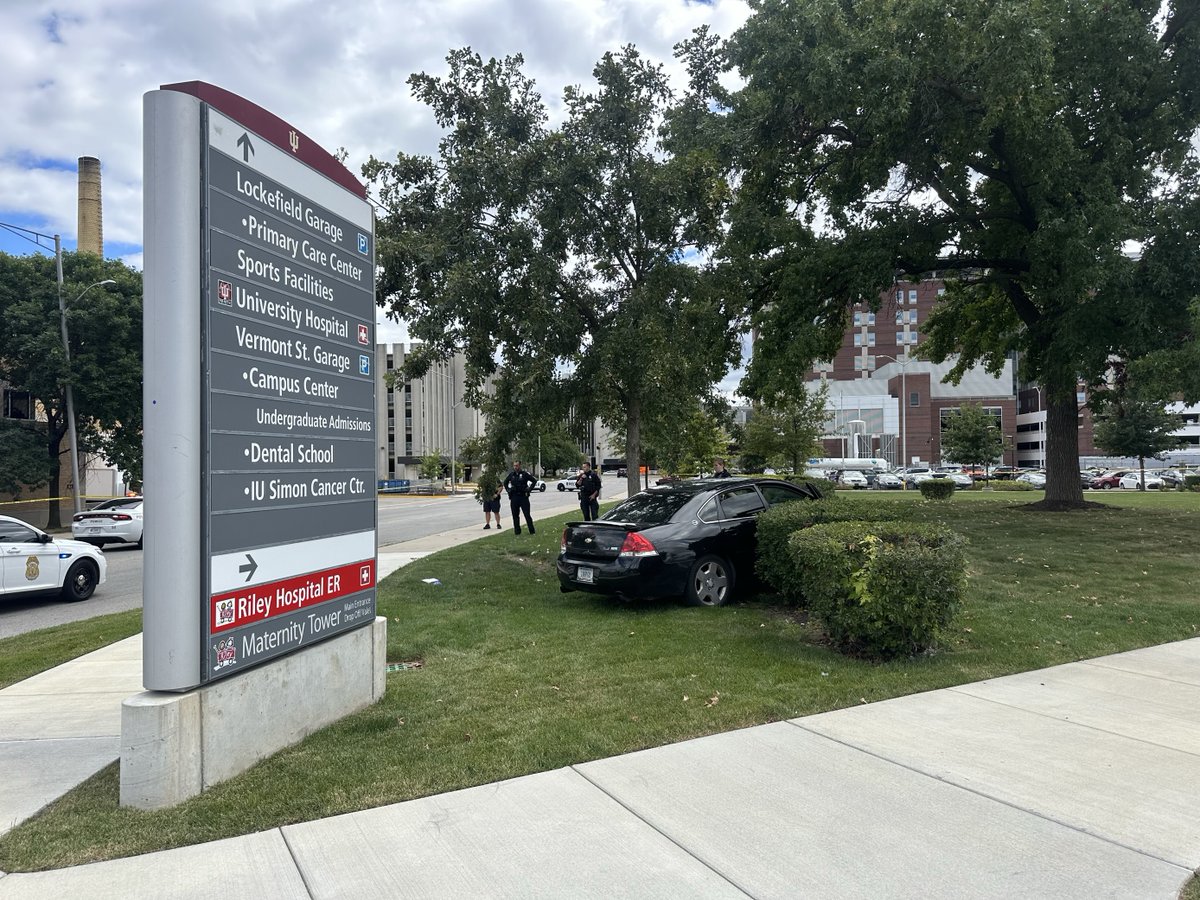 A man is in critical condition after he was found shot just outside of Riley Hospital. There is a car crashed into some bushes and a large area taped off. Unclear how that plays into this