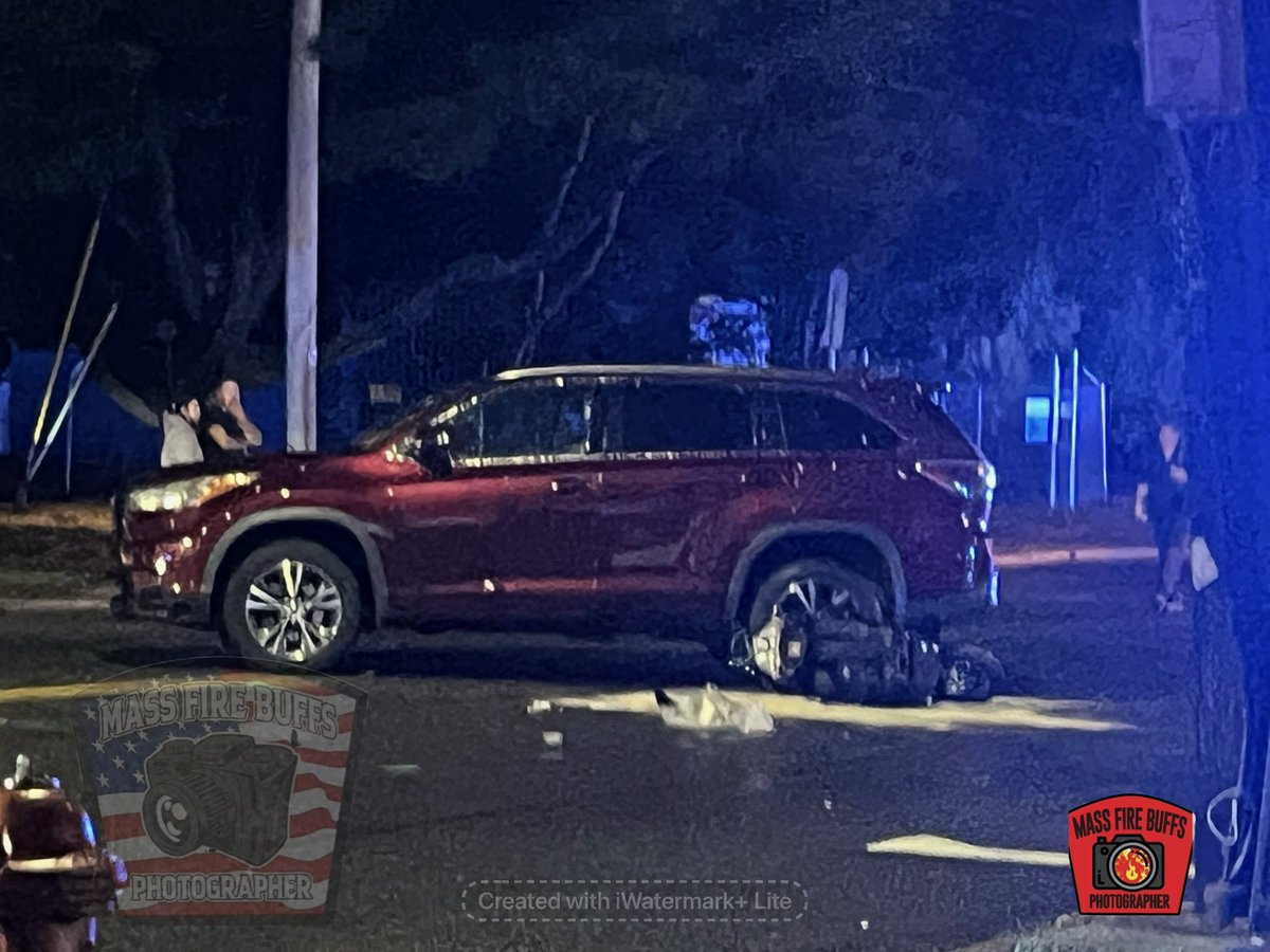 Still a very active seen in LYNN western Avenue at Eastern Avenue car versus moped with rider down traumatic arrest MASS STATE POLICE photo recon on scene investigating the crash