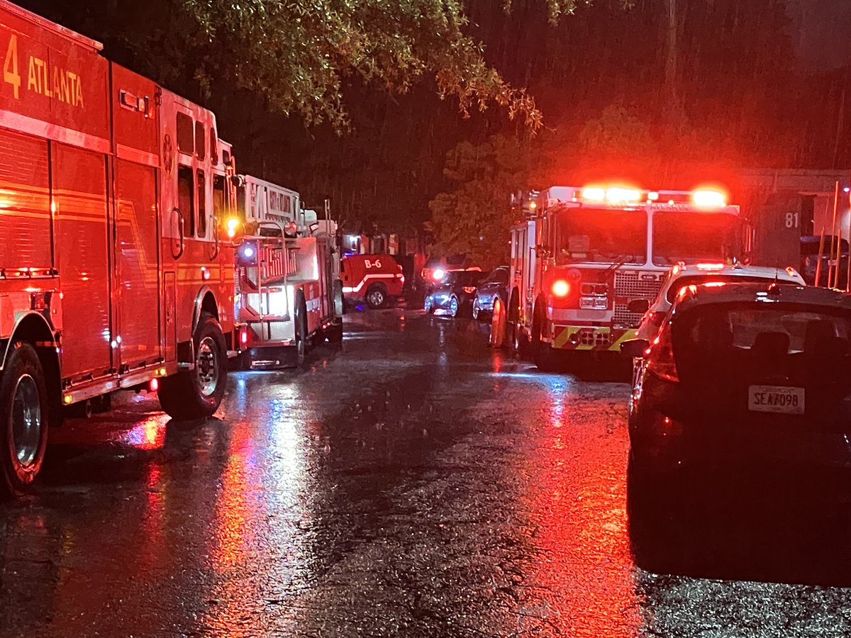 Atlanta fire crews are rescuing residents from their apartments near Buckhead.