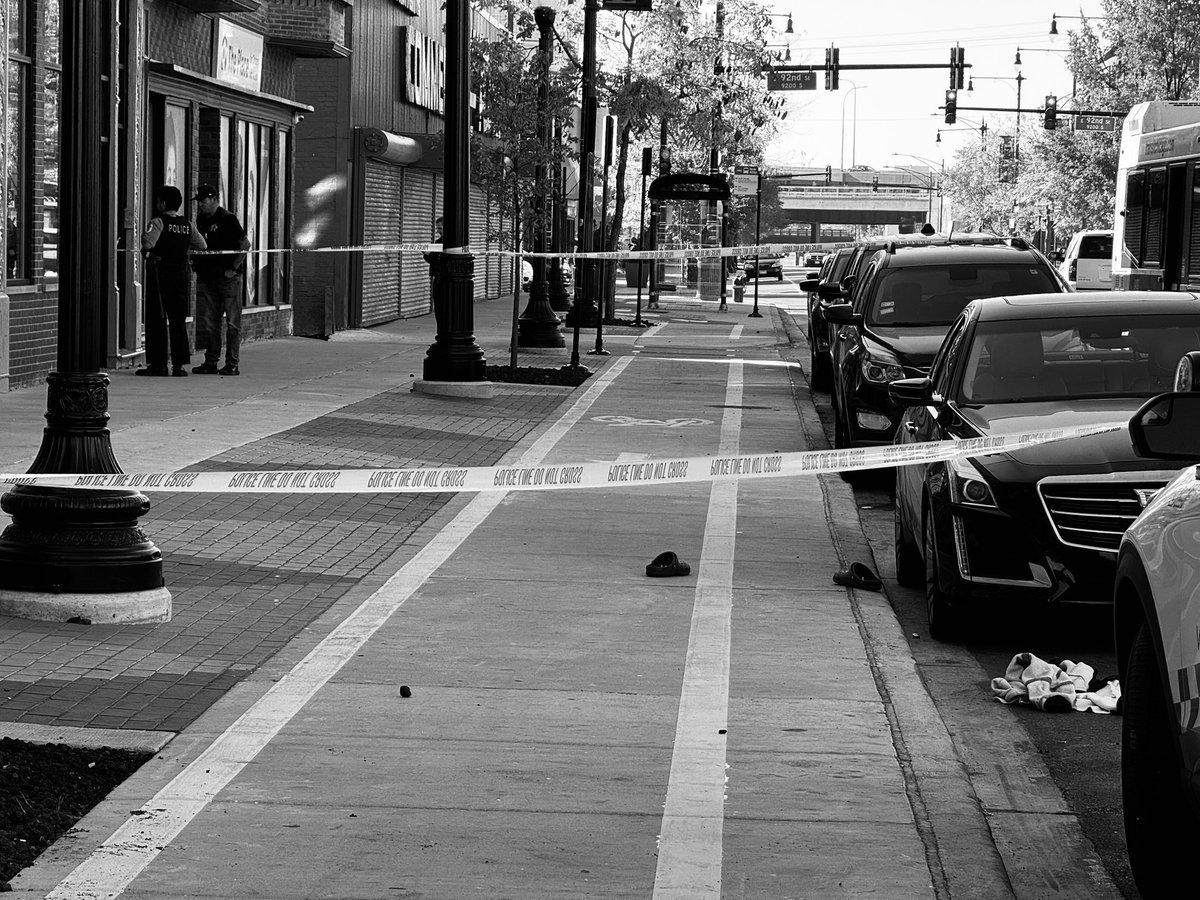 Male (32) shot in the back, 9129 S Commercial Chicago   the crime scene consists of 4 shell casings, blood, a bullet hole to the window of the furniture store, and the victim's shoes and jacket