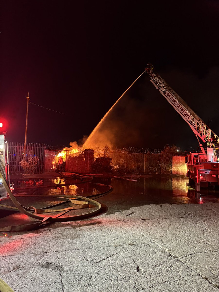 A large outside fire at 3rd and Cargo streets involving a pile of construction vehicle tires is being extinguished. Cargo is closed. Do not drive over fire hoses in the street.The cause of this fire is unknown