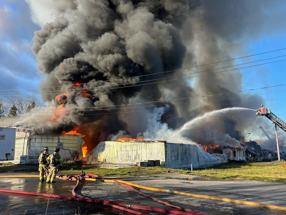 Firefighters from several companies are at the scene of a fire on Howard St. in the city of Batavia. The structure is a warehouse believed to be owned by @BaskinLivestock