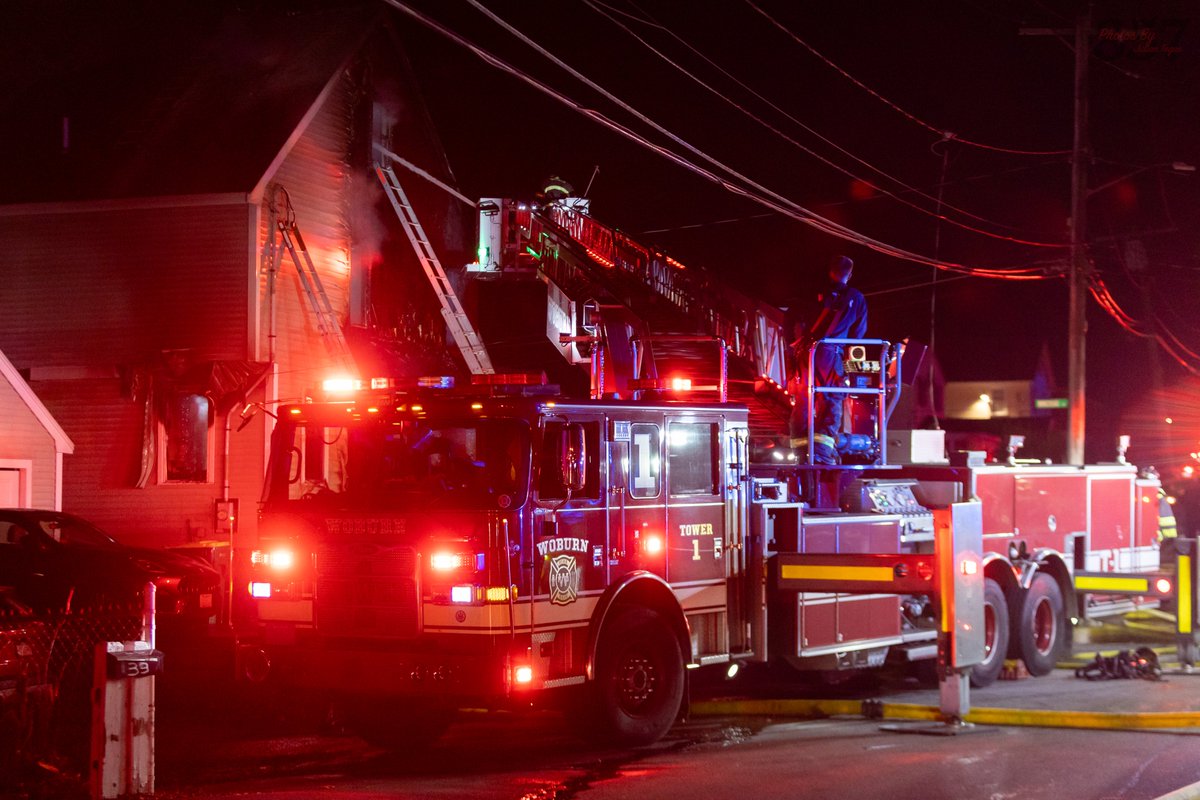 A 2-Alarm blaze ripped through a Woburn Home last night, bringing numerous mutual aid companies to the scene. Companies arrived to heavy fire from the first floor of the 2.5 story house which extended up into the attic