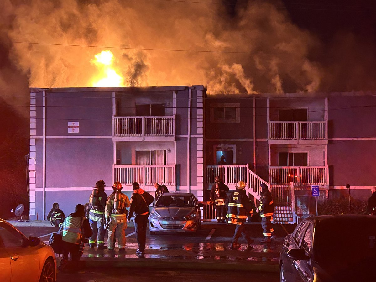 Firefighters battling heavy smoke and flames at an apartment building in College Park.