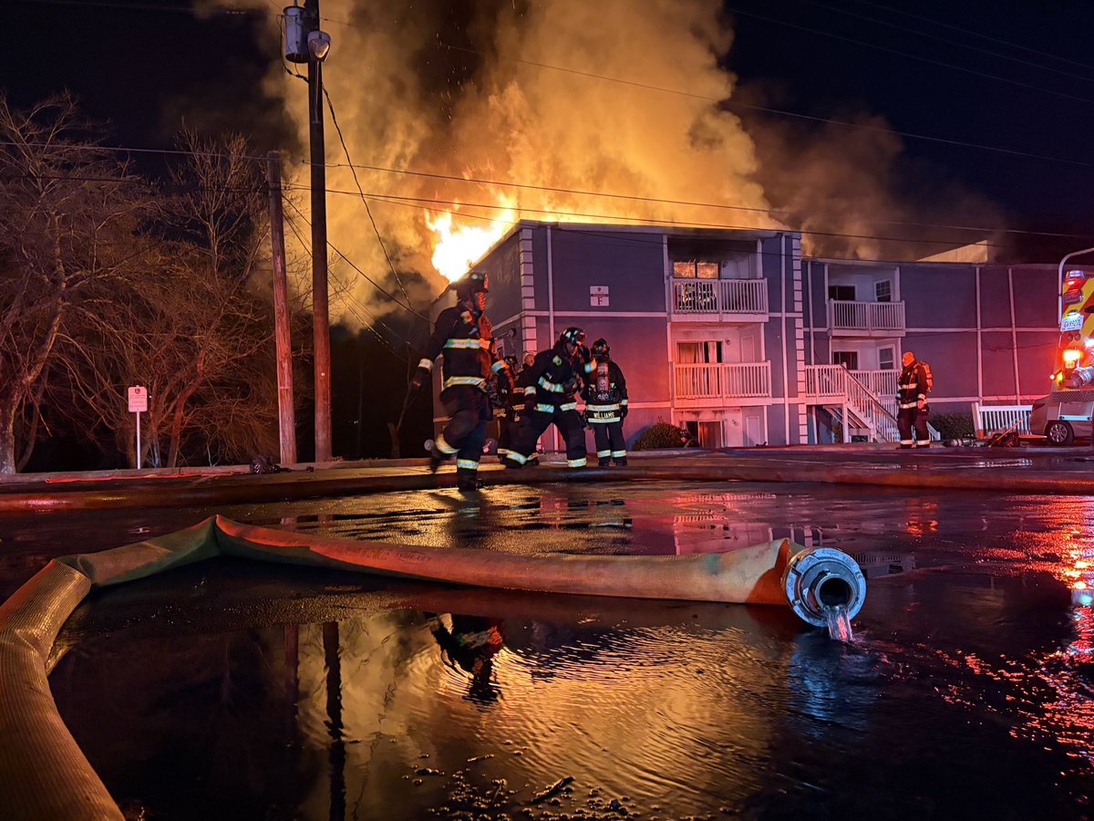 Fire engulfing apartment building in College Park. Firefighters having trouble getting water to the flames