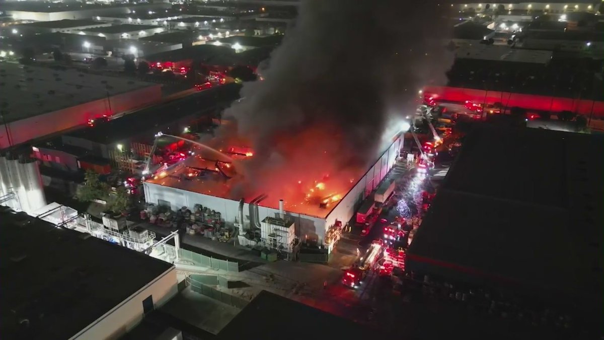 A large fire at a commercial building in the city of Commerce sent toxic smoke into the air late Saturday night