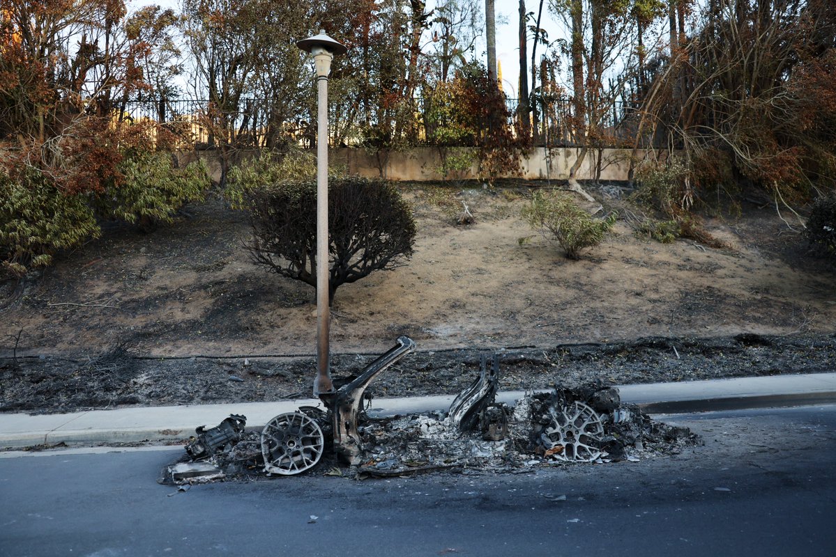 Search teams looking for people killed in devastating Los Angeles blazes moved from house to house on Monday, as firefighters girded for hurricane-force winds that could spark further flare-ups