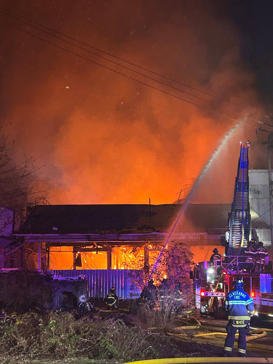 Clock in was fire cruiser on scene of a commercial fire in Oregon city on the property that used to be the blue Heron papermill. Highway 99E is closed down in downtown Oregon city.