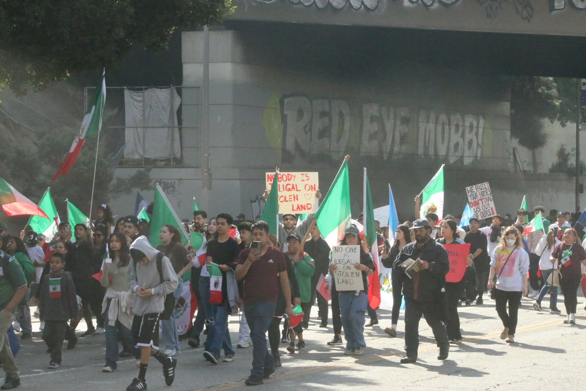 ICE PROTESTS 300 to 400 people marching up Figueroa St accompanied by 100 to 200 cars. Mexican and Salvadoran flags in abundance. LAPD and CHP mobilized. No indication if the group will try to block freeways