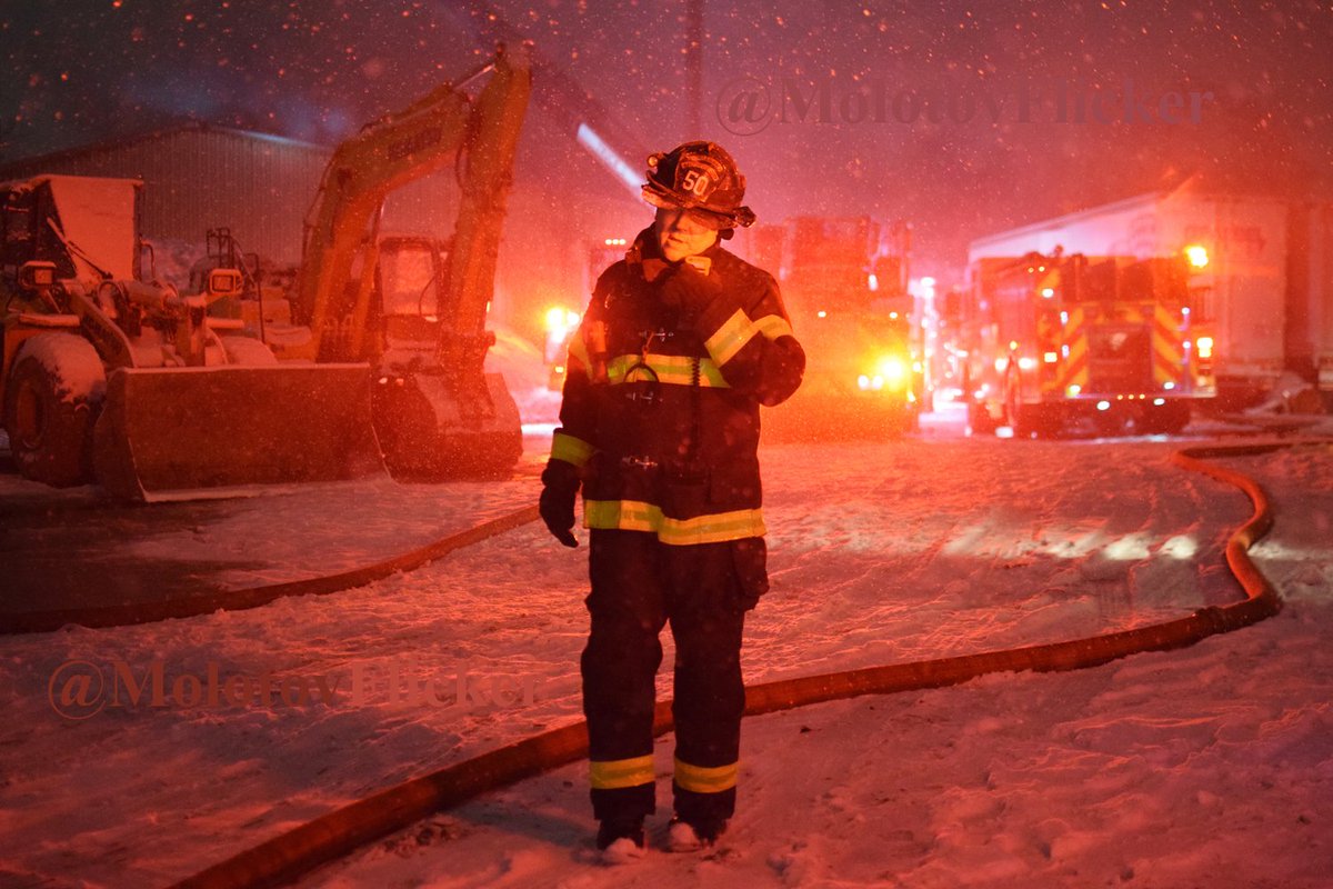 Baltimore firefighters battled a two-alarm fire in the 4200 block of Shannon Drive during a snowstorm on Tuesday.