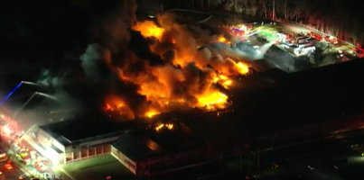 Crews are still on scene tackling a massive 4-alarm warehouse fire in Montgomery County several hours after it began.