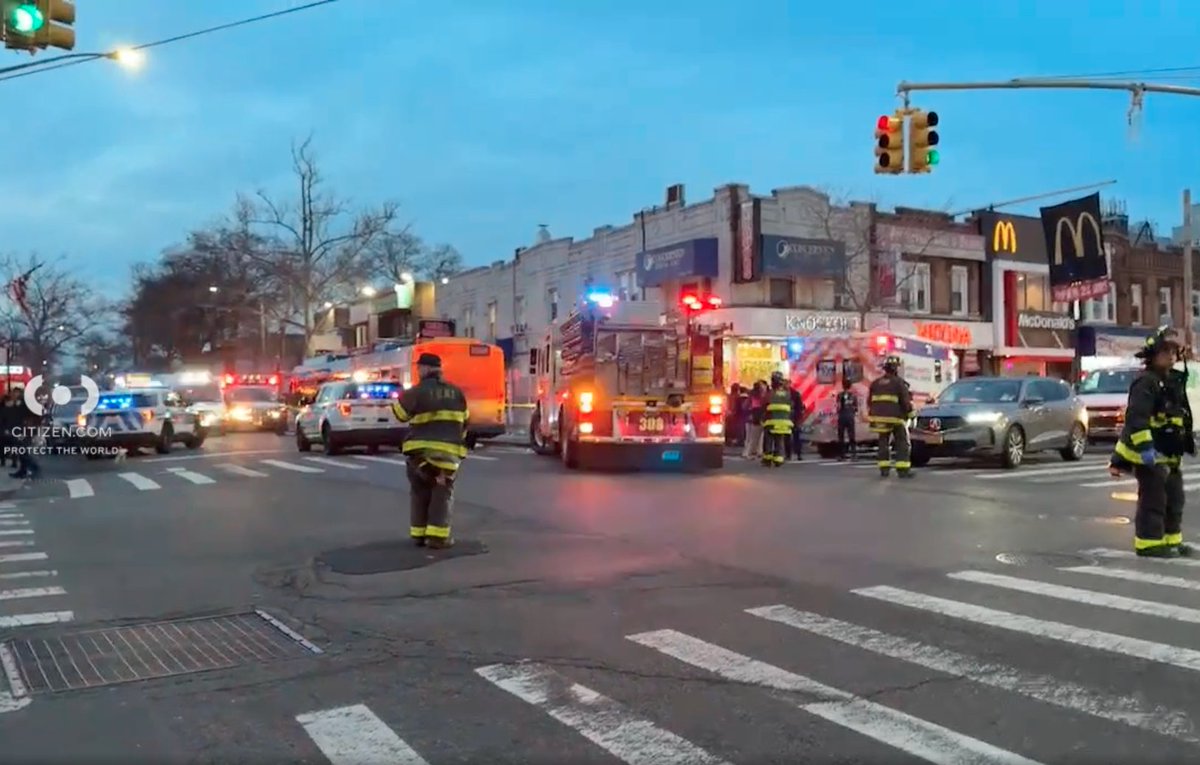 9 injured after driver, 79, crashes into MTA bus, mounts sidewalk in Queens