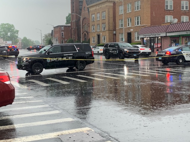 A stabbing led to a shooting during a funeral service at a church in Hartford, according to police