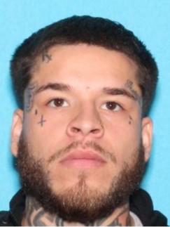 A man was arrested after a standoff that resulted in an officer-involved shooting in Fresno on Sunday.