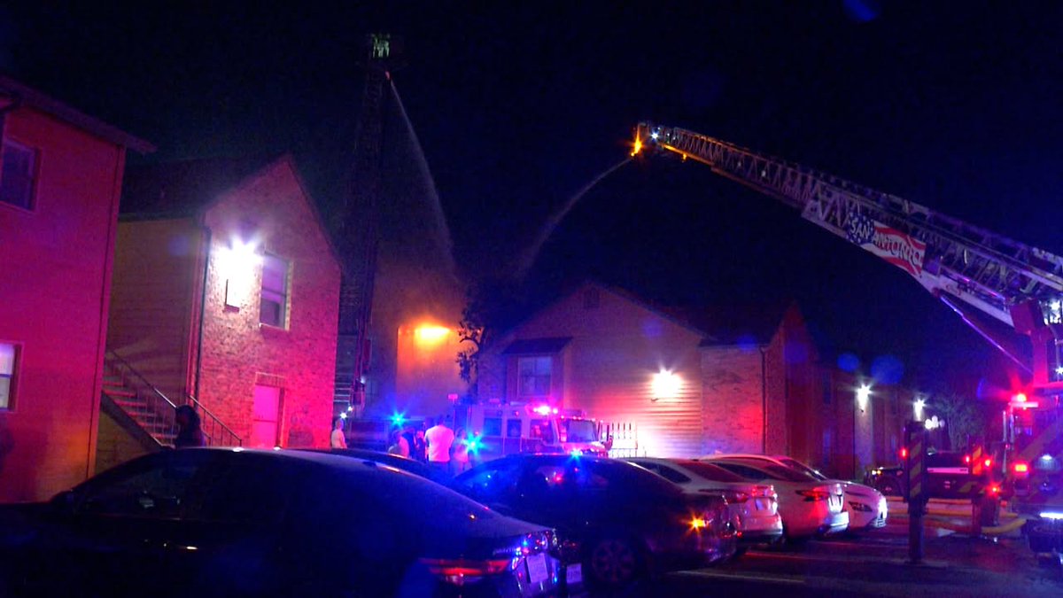 Fire engulfs Northeast Side apartments as 100 firefighters battle two-alarm blaze