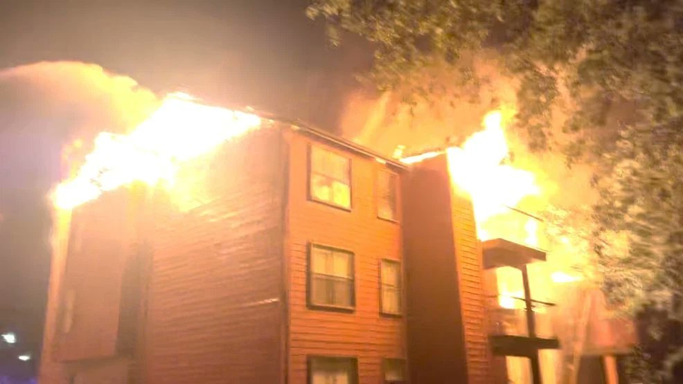 Fire engulfs Northeast Side apartments as 100 firefighters battle two-alarm blaze