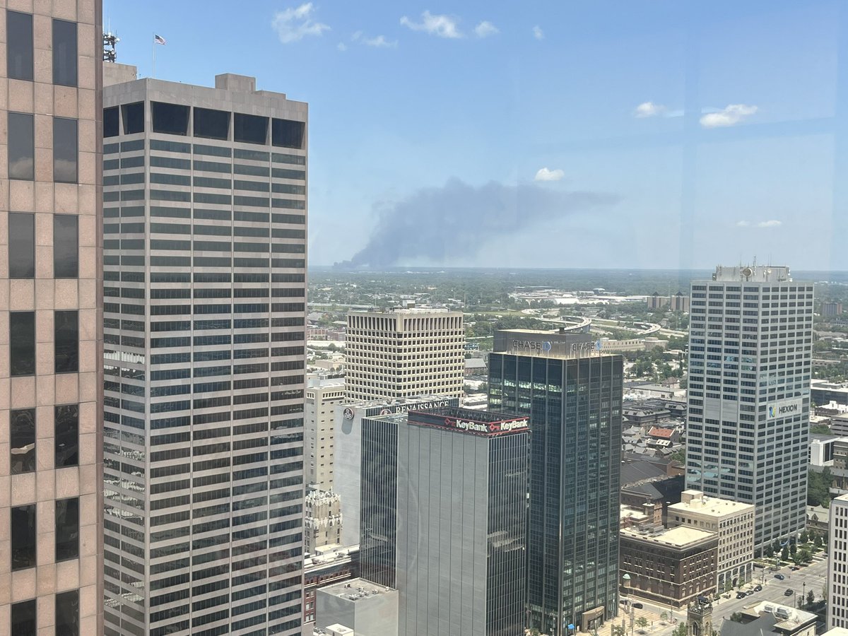 An overturned tanker has caught fire at the interchange of 270 and 161 in Columbus, OH.  .Large fire seen from downtown Columbus