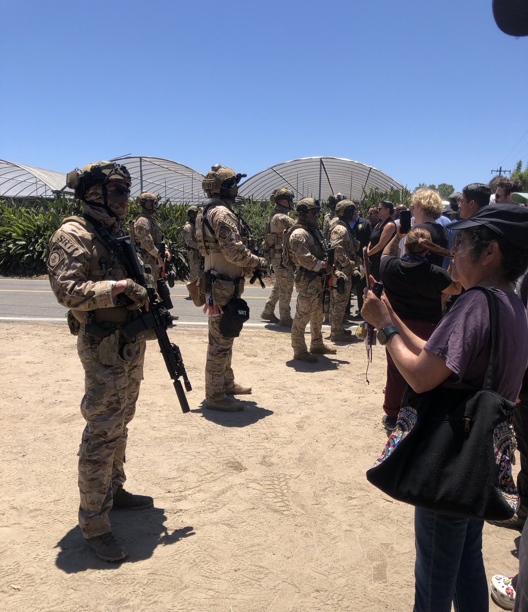 ICE raid in Carpinteria draws angry crowd of protesters.  Raids believed to be targeting two farms off of Foothill Road draws about 150 demonstrators