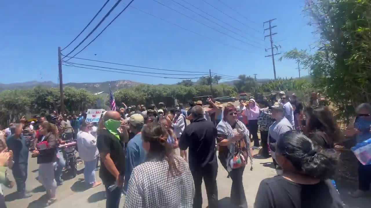 A very large crowd gathered at Foothill and Casitas Pass Road for about two hours. 10 people were reportedly taken away from a nearby cannabis farm