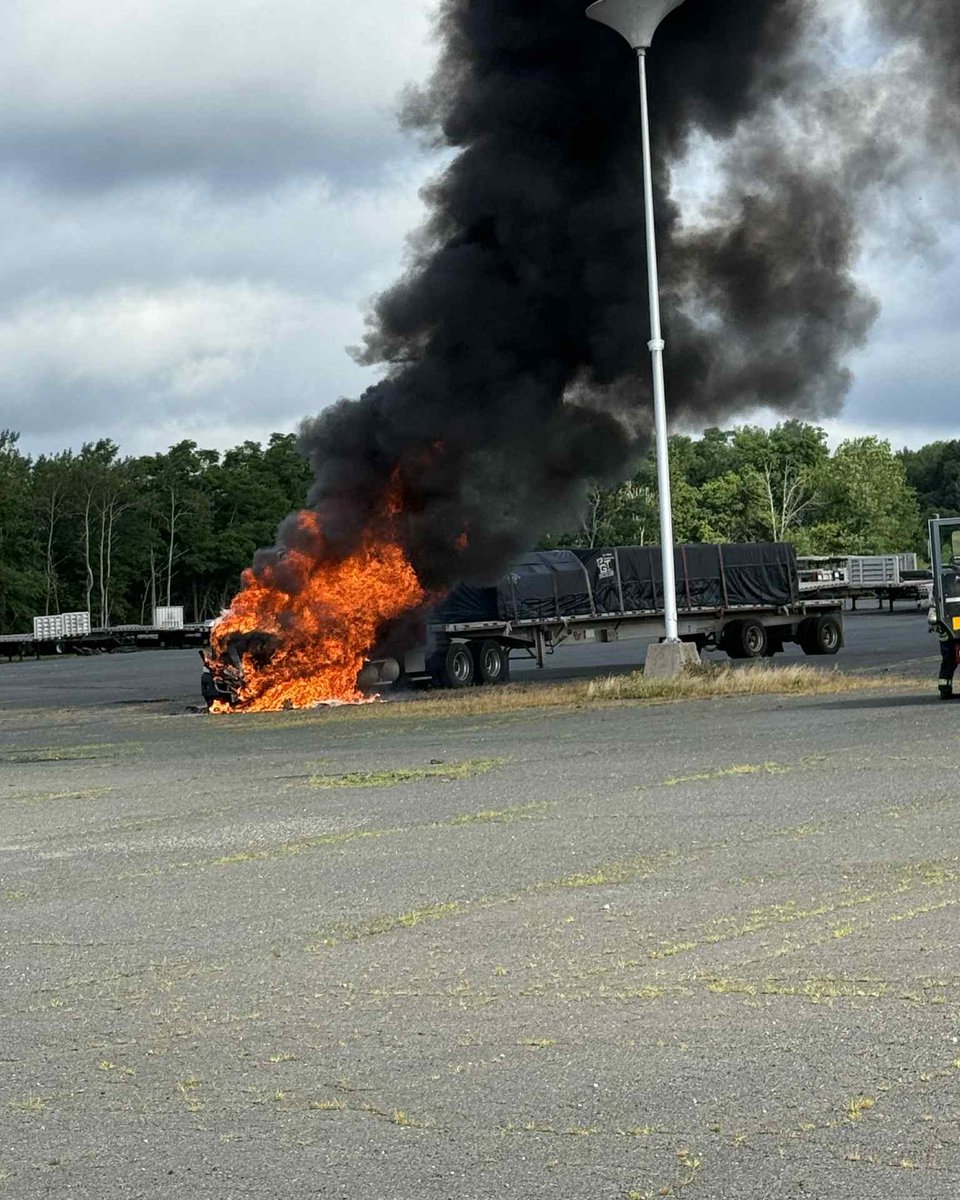 A tractor-trailer burst into flames in Bristol on Sunday morning, according to officials