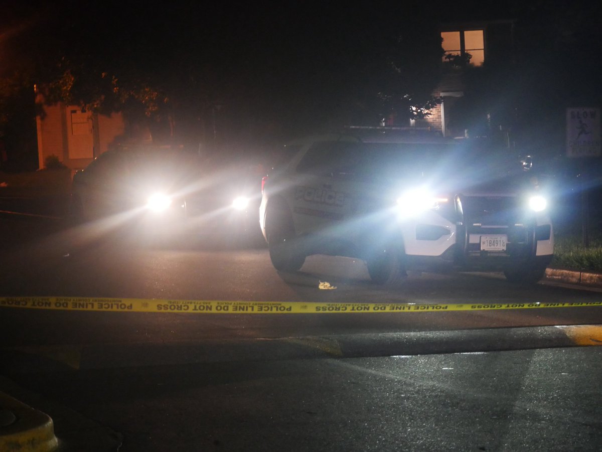 Montgomery County Police investigating a reported shots fired incident on Castle Terrace around midnight. Ambulance just left without a patient; no injuries reported. Nearby roads closed for evidence collection