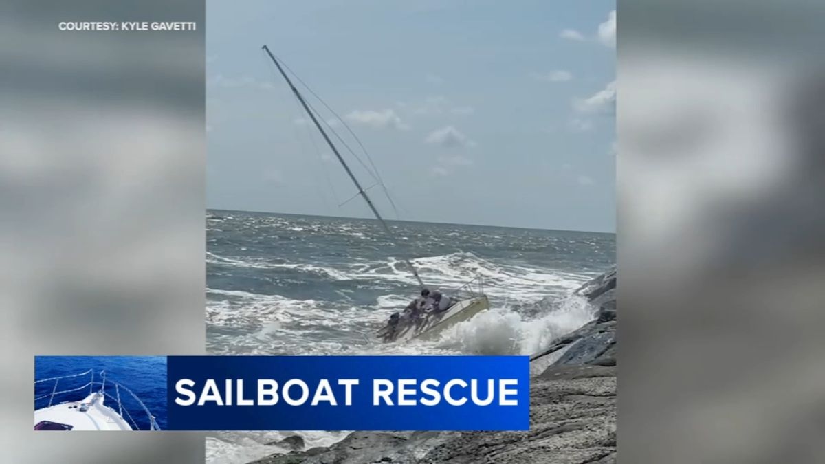 10 rescued from sinking sailboat after hitting rocks Avalon, New Jersey