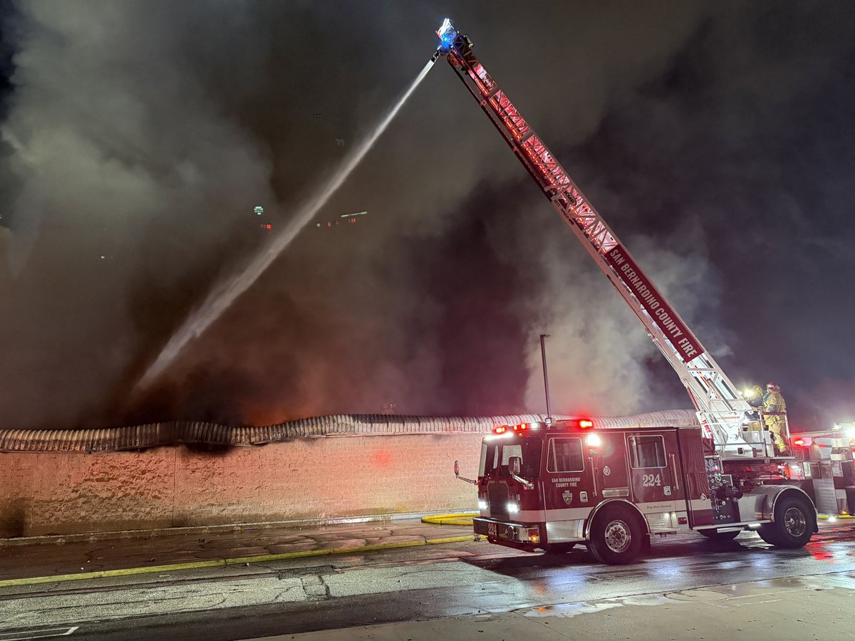 SAN BERNARDINO: Units on scene of a Commercial structure fire at East 100 block of Club Center Drive. Storage building with heavy fire. ClubCenter Incident now second alarm. Crews in defensive strategy with multiple elevated water streams from ladder trucks