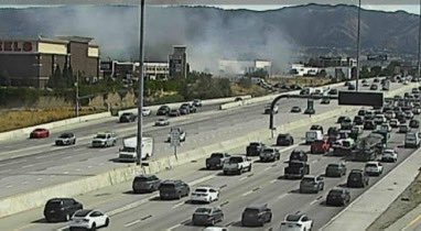 11200 S State St. Fire crews arriving on a field fire burning towards I-15. GatewayCommand advised that there are rocks surrounding the fire so more than likely will burn itself out