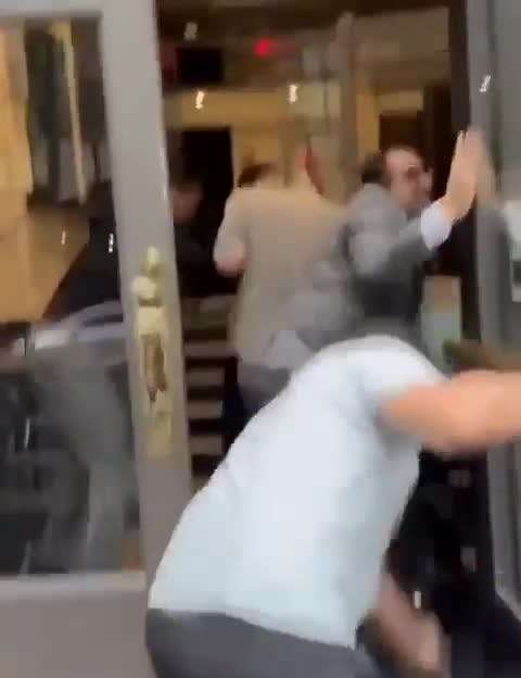 Security personnel at the Egyptian Embassy in New York dragged two Hamas supporters into the embassy and beat them, before handing them over to local police. This follows a series of violent protests outside Egyptian embassies worldwide over the war in Gaza
