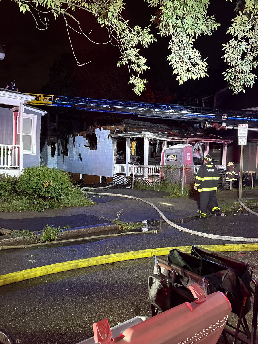 A massive fire ripped through this home on Thurston Street. The fire chief says the collapse made the fire spread to 2 neighboring homes. No injuries reported but the 2 impacted homes have extensive damage   the residents are displaced