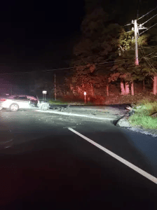 Crews said they saw a car blocking the roadway and a telephone pole snapped in half at the scene of a crash in Litchfield early Monday morning