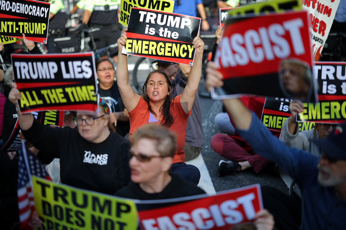 Demonstrators with placards sit on a road during a protest near the 80th United Nations General Assembly at the UN headquarters in New York City   Carlos Barria
