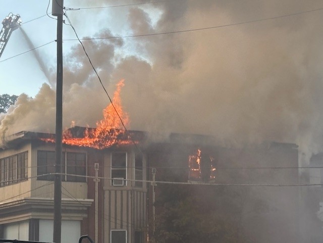 Crews in Birmingham continue to fight a fire that has involved four structures on 20th Street South. No injuries reported at this time