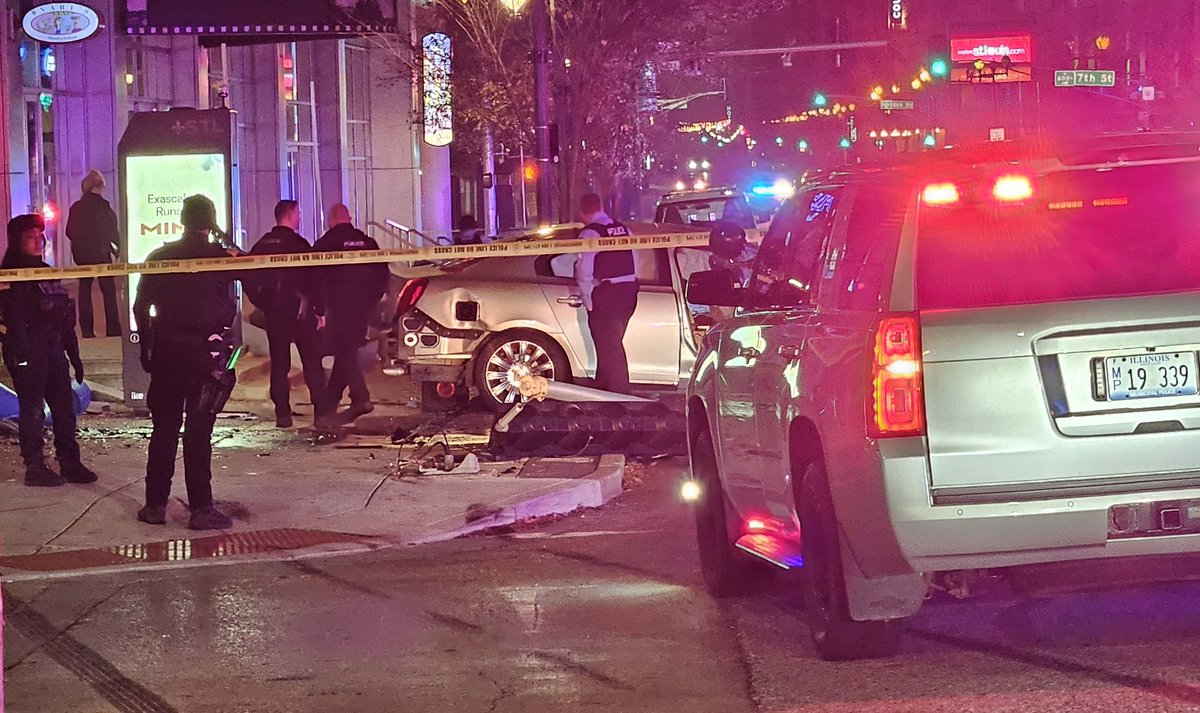 Police on the scene of a crash at 6th & Washington in Downtown St. Louis. The crashed vehicle was being chased by police from Washington Park, Illinois. The driver of the vehicle was taken to hospital by St. Louis Fire Department medics