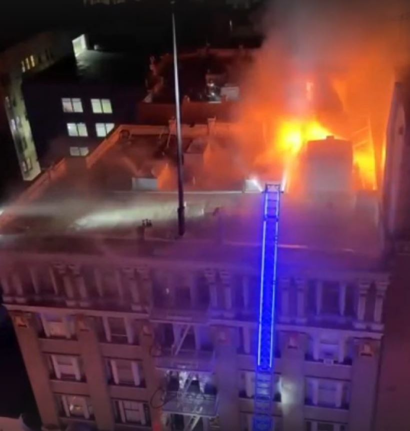 A three-alarm fire tore through the top floors of an apartment building in San Francisco's Tenderloin neighborhood early this morning, displacing 45 residents, fire officials say.