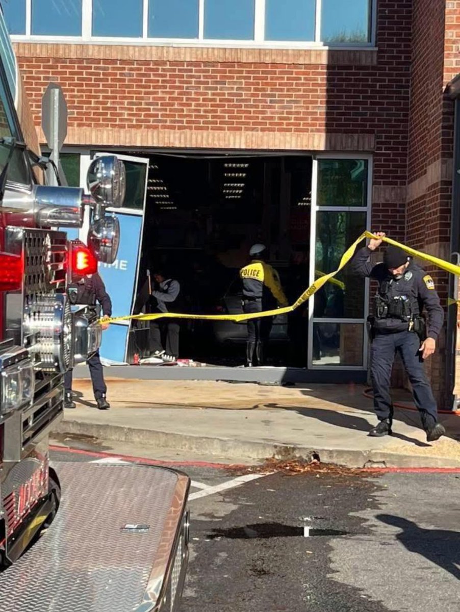 Four people were injured when a car crashed through a Kroger in Athens on Tuesday, according to police.