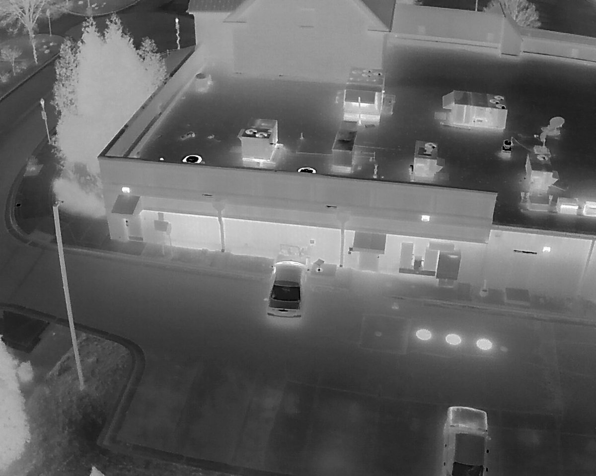 Olney, MD - Aerial thermal scans of the vehicle into the building damaged gas meter and resulting gas leak at 18100 Blk Town Center Dr, Greene Turtle. Man seen in the video is gas company assisting