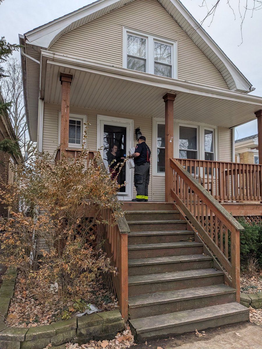 CFD members of Engine 69 and Truck 38 passed out smoke detectors in the 4700 block of North Kewanee Avenue. A woman died and two relatives were injured from a house fire on the block on Sunday