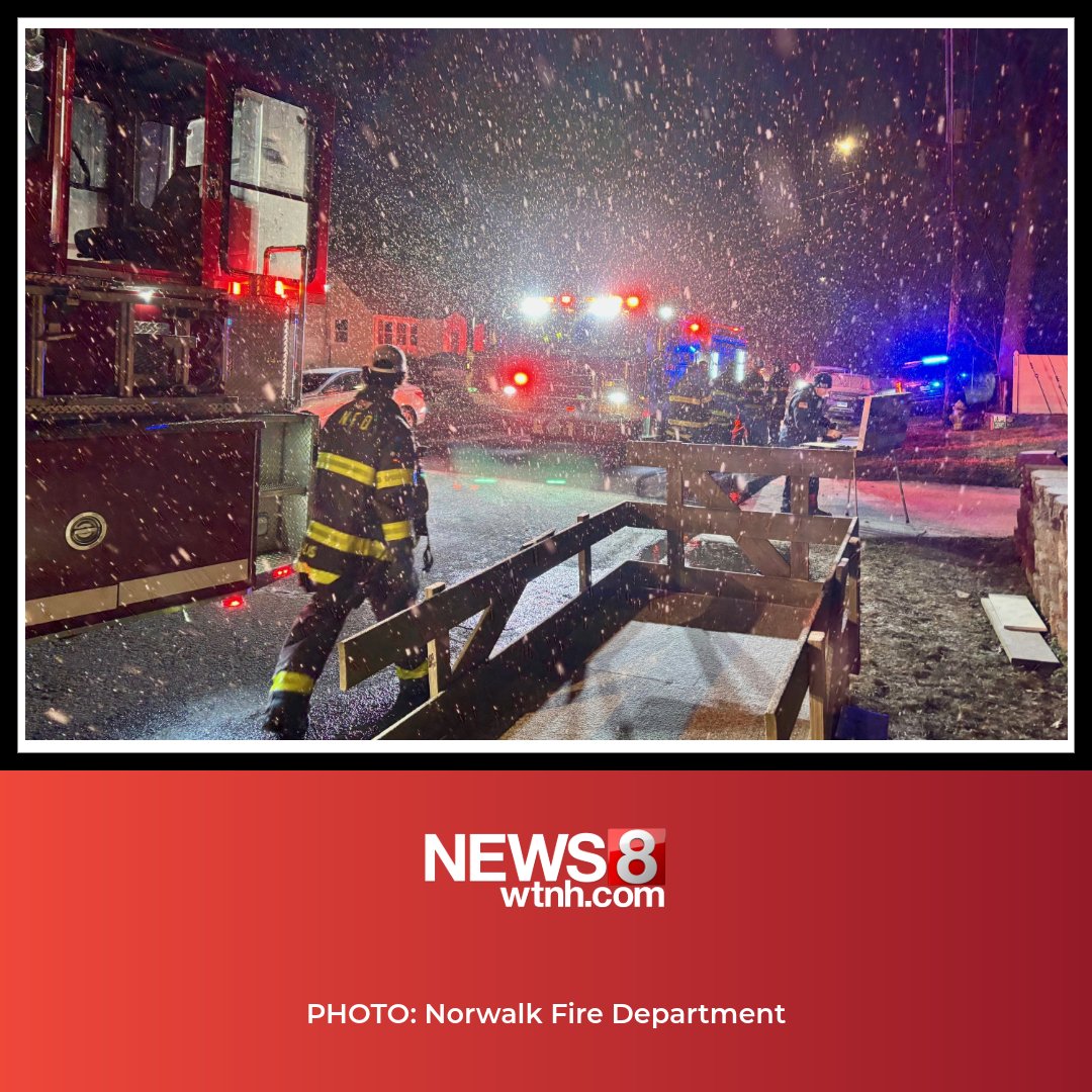 Firefighters rescued a dog from a house fire which displaced three people on Silk Street in Norwalk on Friday, the Norwalk Fire Department said