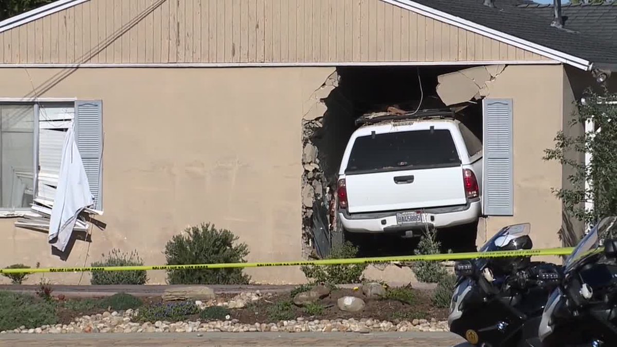 Husband crashes vehicle into home, killing wife; police suspect intentional act: