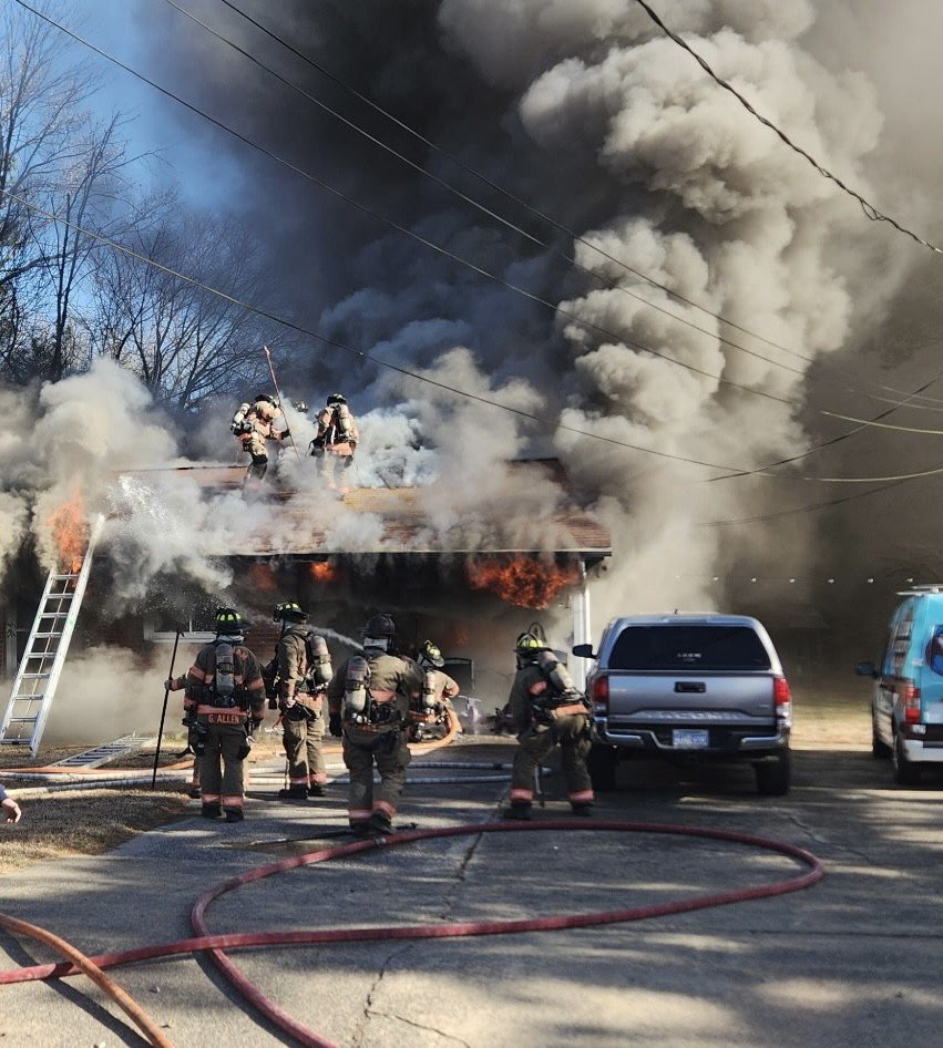 A fire at a home in Durham Tuesday afternoon prompted a response from about 40 firefighters, officials said