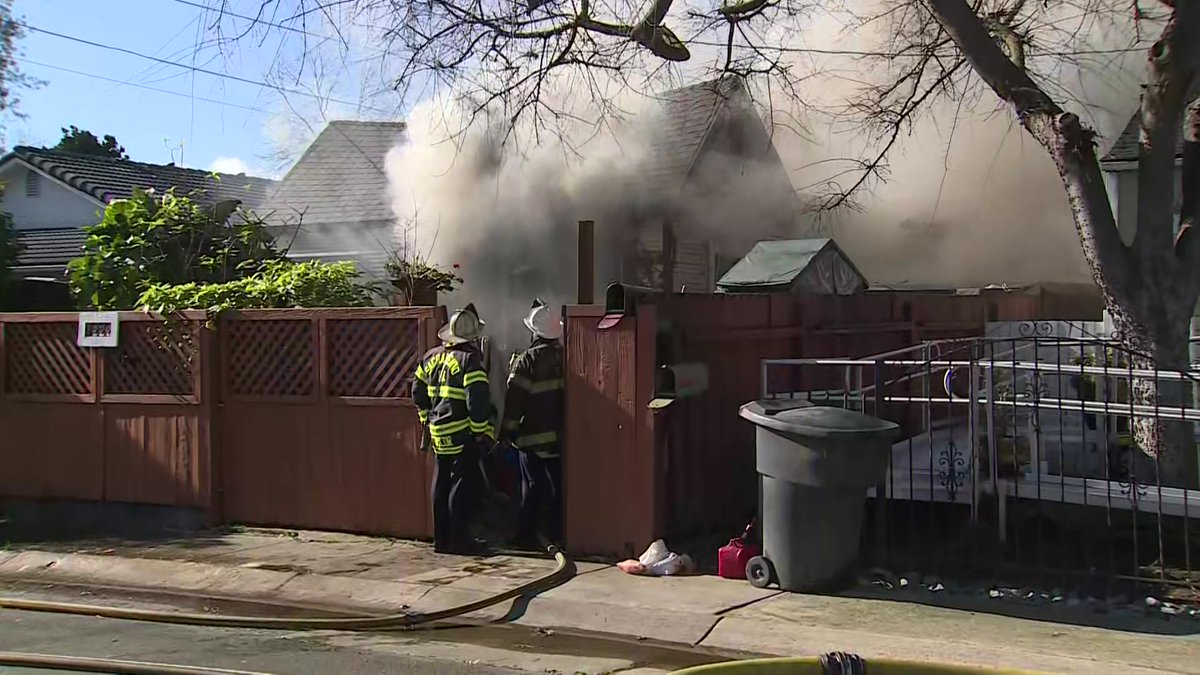 Sacramento firefighters respond to structure fire in Oak Park with reports of explosions