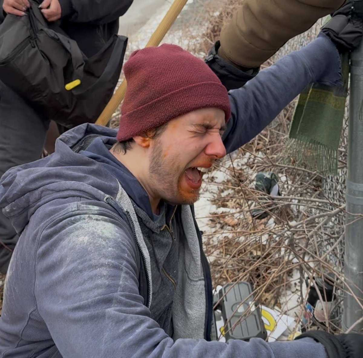 DHS has announced 12 arrests were made yesterday outside of the Whipple building *Protester takes a face full of pepper spray Rioter screams for HELP after taking pepper spray to face outside Minneapolis federal building